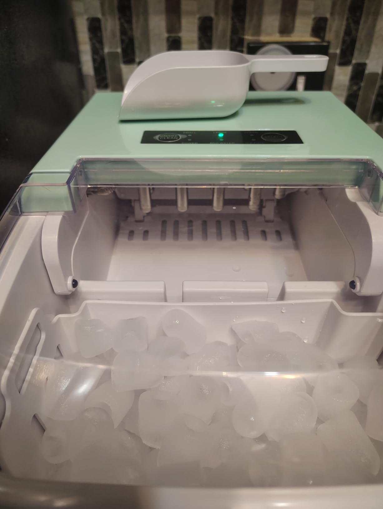 DUMOS Countertop Ice Maker with Handle, 26lbs/24H Portable Ice Machine, 9 Bullet Cubes Ready in 6 Mins, Self-Cleaning, Quiet Compact for Home, Kitchen, RV, Camping, Bright Black customer photo 2