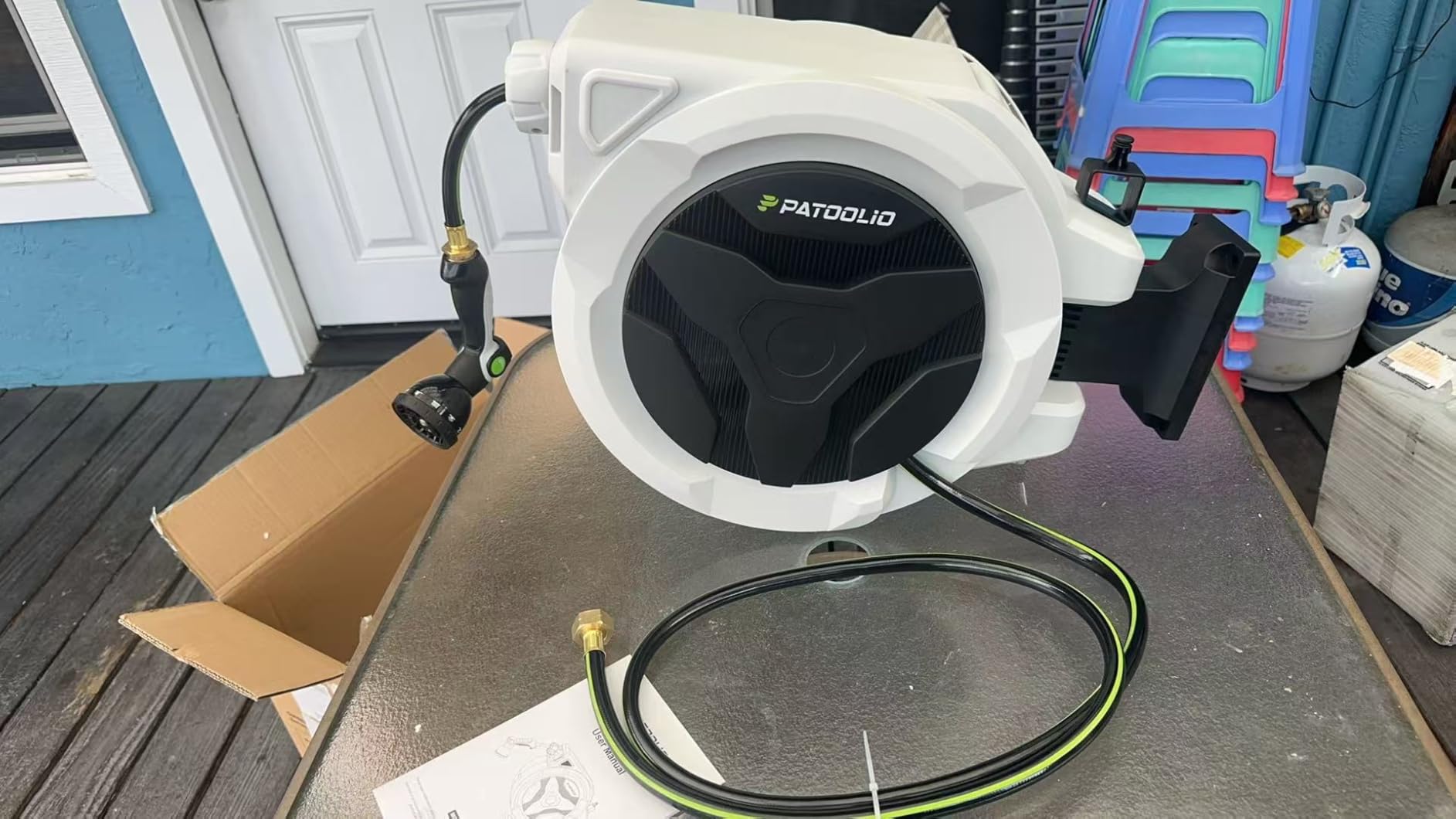 Retractable Garden Hose Reel 100ft, 1/2'' Wall Mounted Water Hose Reel Heavy Duty with 10 Pattern Nozzle, Slow Auto Rewind customer photo 1