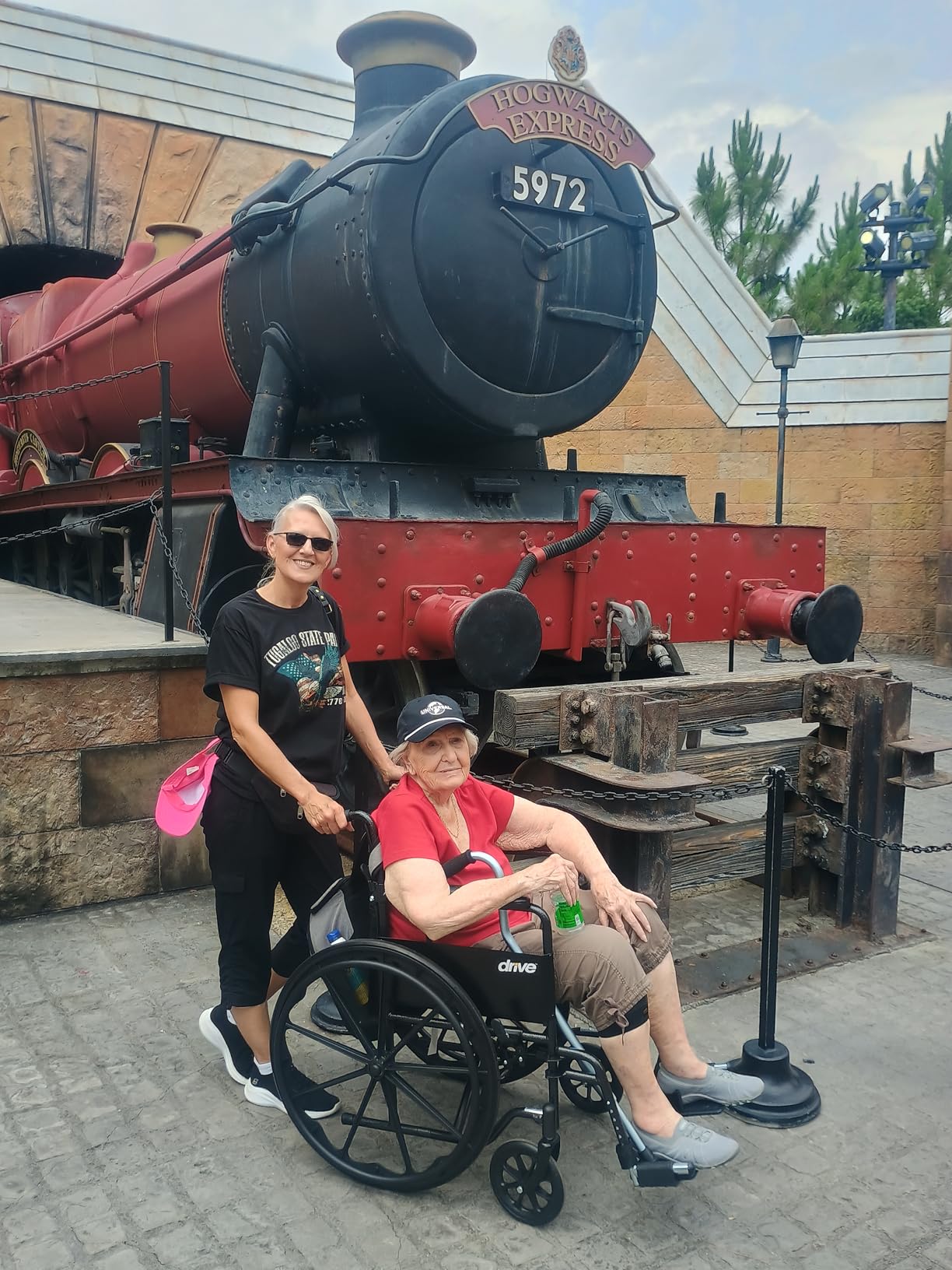 Drive Medical Silver Sport 1 Folding Transport Wheelchair - Lightweight Mobility Support - Full Armrests - Removable Swing-Away Footrests - Durable Steel Construction - Compact Folding Frame - Black customer photo 1