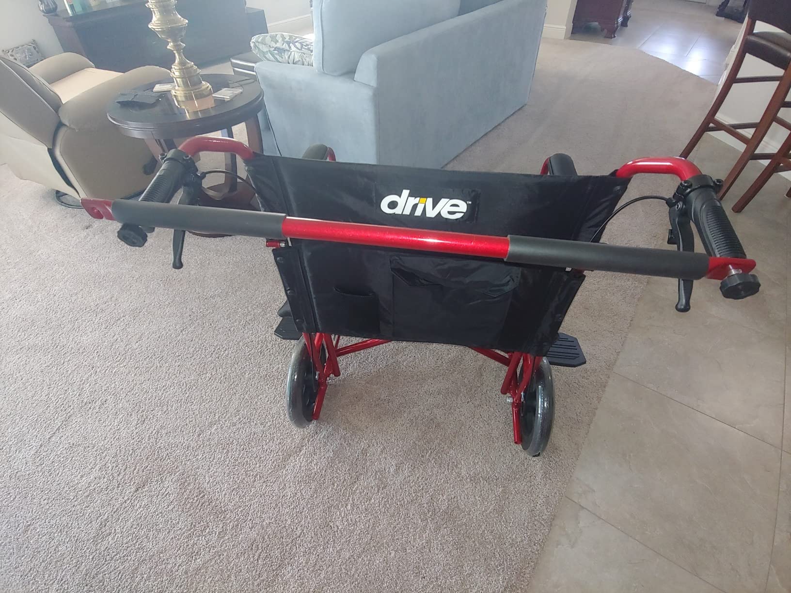 Drive Medical Bariatric Transport Chair Folding, Full Length Arms with 12 Inches Rear Flat Free Wheels, Red, 22 Inches customer photo 1