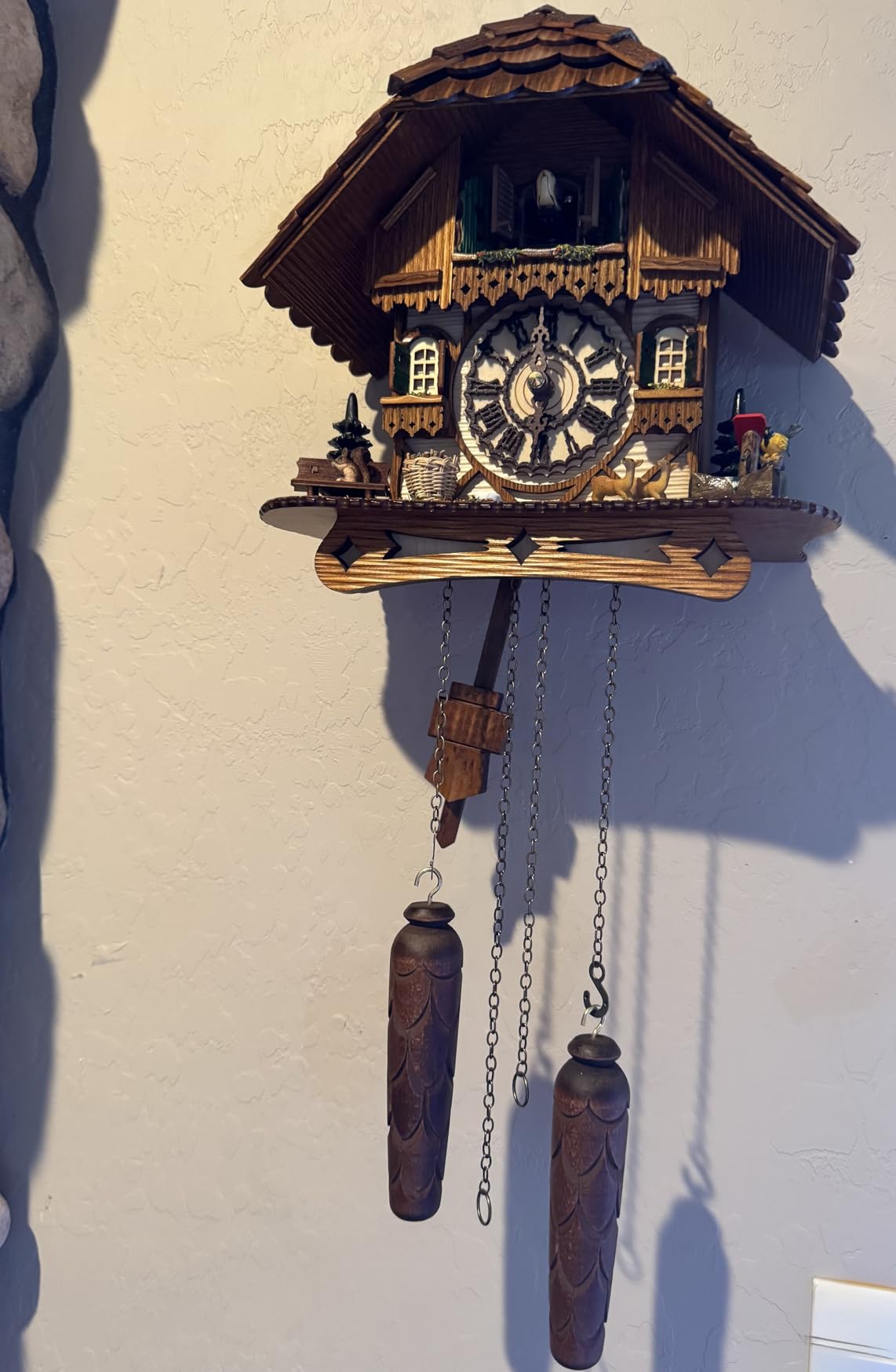 Cuckoo Palace German Cuckoo Clock - Black Forest Hillside Chalet with Animal Figures - Quartz Movement with Music - Night Silence Sensor - 10.6 Inch Wall Clock customer photo 2