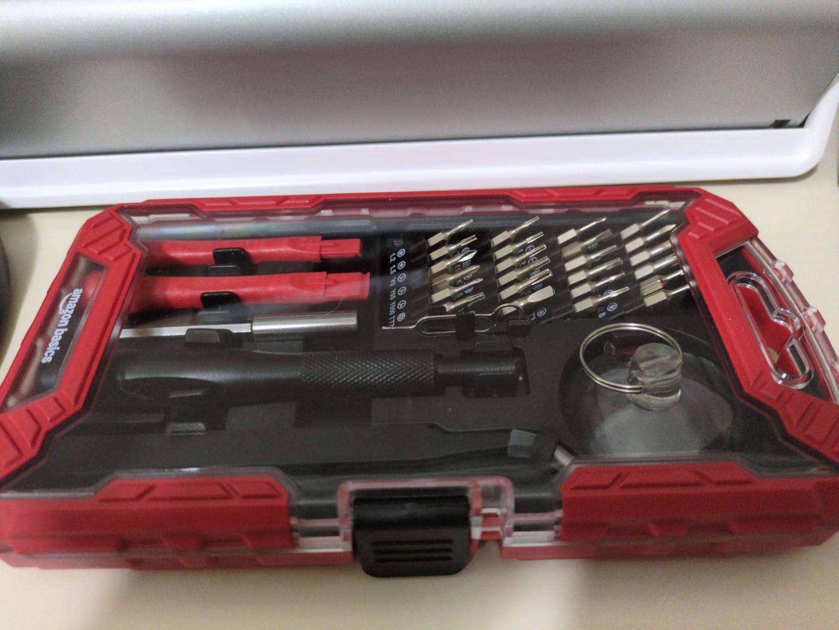 Amazon Basics Precision Screwdriver Set, 32-Piece Electronics Repair Tool Kit for Laptops, Smartphones, Eyeglasses, Watches, Magnetic Tip, Red customer photo 1