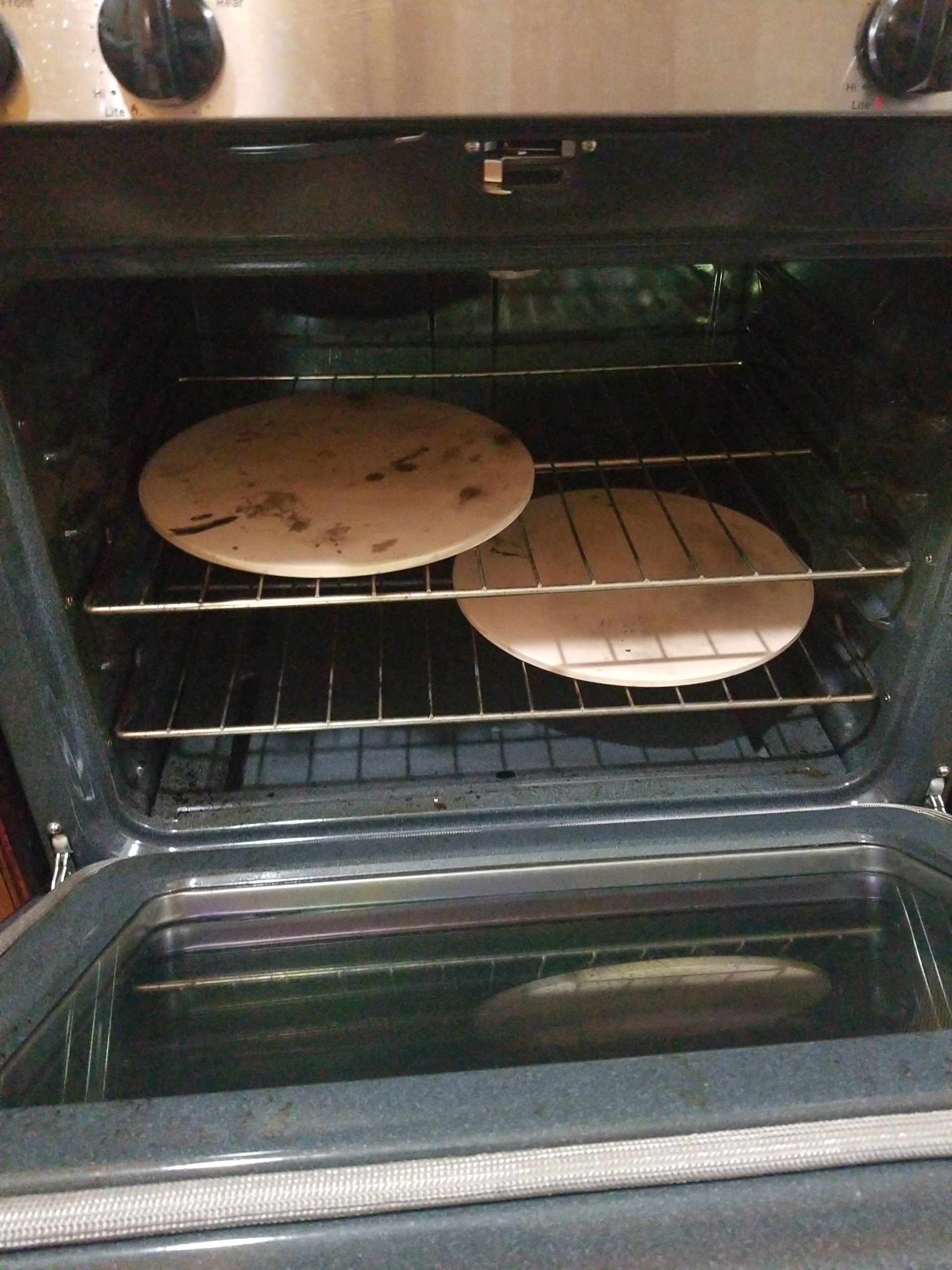 Nordic Ware 14-Inch Square Pizza and Baking Stone, Oven Safe and Grill Safe Cordierite with Stainless Holder customer photo 2