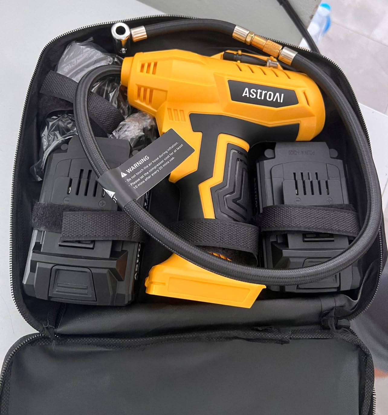 AstroAI Cordless Tire Inflator Portable Air Compressor Fast Inflation 160 PSI Air Pump 20V Rechargeable Battery Powered with 12V DC Adapter Digital Pressure Gauge for Cars Motorcycles Bikes Yellow customer photo 1