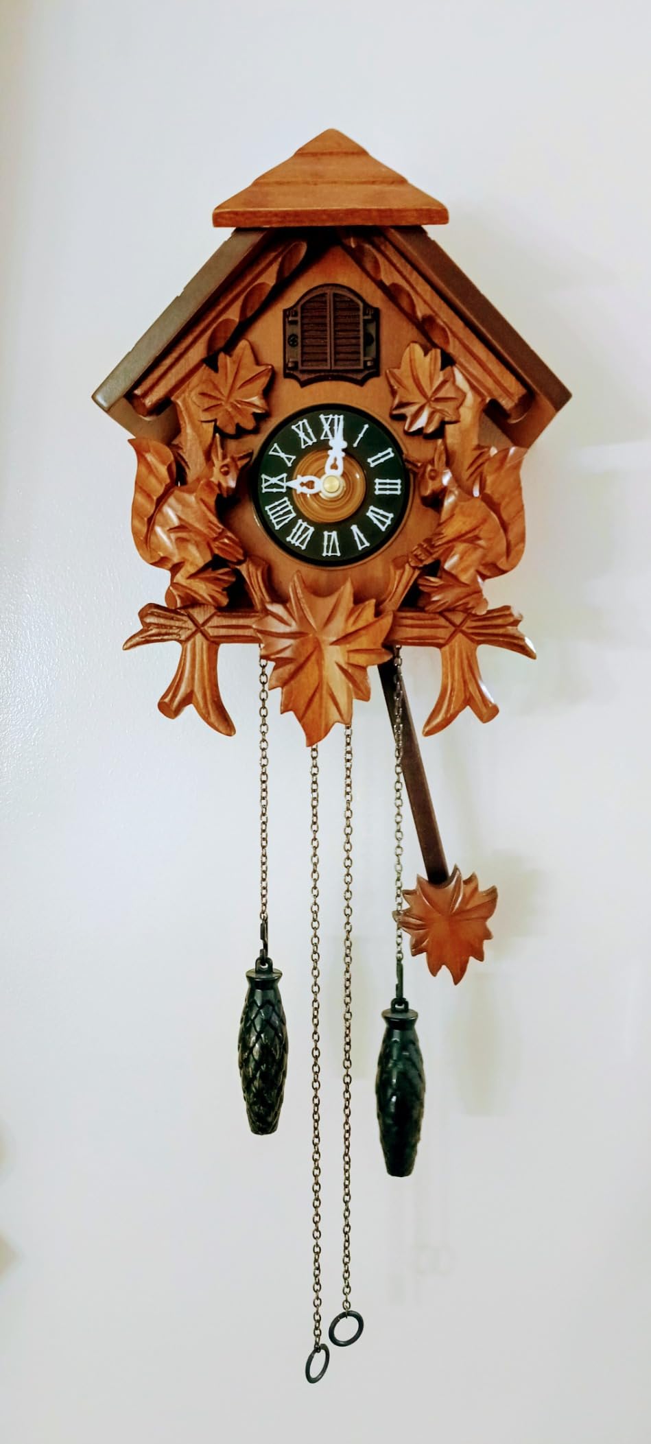 TIMEGEAR Cuckoo Wall Clock with Night Mode in Traditional German Style with Carved Squirrels (Cherry) customer photo 1