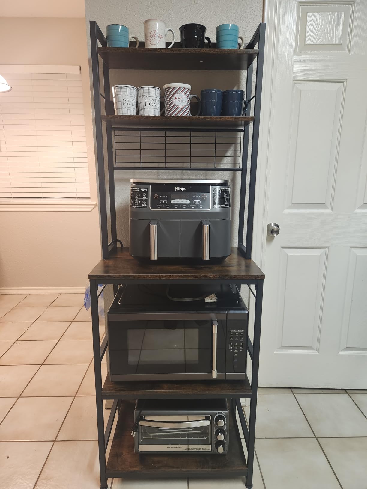VASAGLE Bakers Rack with Power Outlet, Microwave Stand, Kitchen Tall Utility Storage Shelf, with Metal Wire Panel, 14 Hooks, 15.7 x 31.5 x 66.9 Inches, Rustic Brown and Ink Black UKKS025B01 customer photo 1