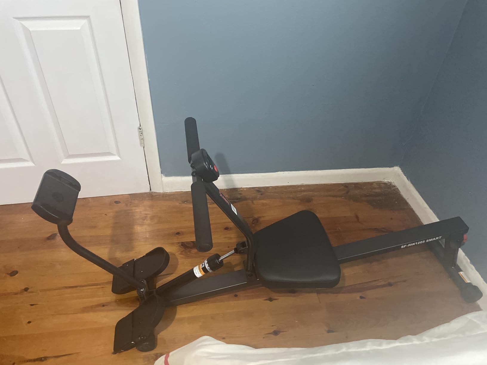 Sunny Health & Fitness Compact Adjustable Rowing Machine with 12 Levels of Resistance for Complete Body Workouts and Optional Free SunnyFit App Enhanced Connectivity customer photo 1
