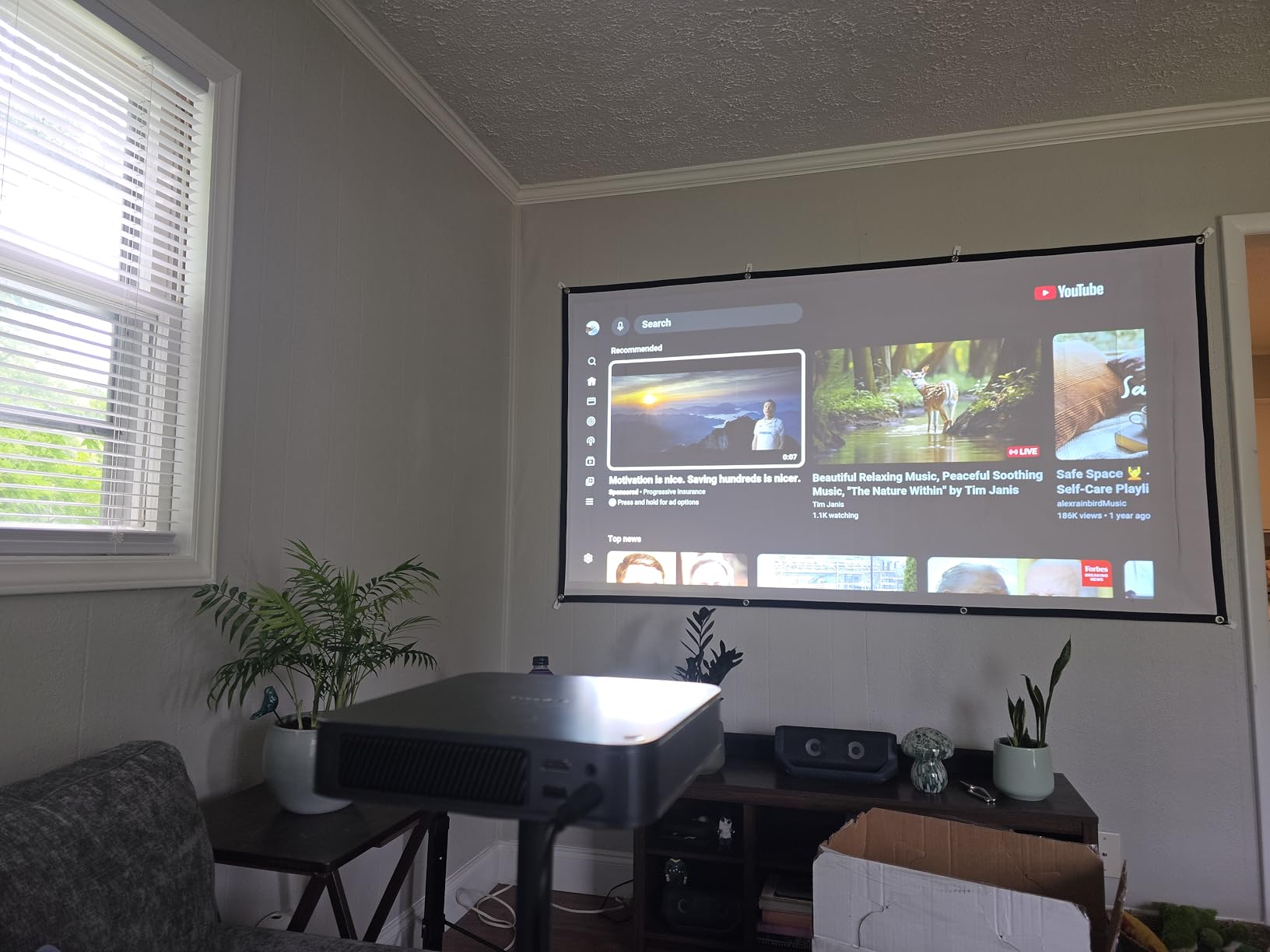 Dangbei Atom Portable Laser Projector, Google TV with Official Netflix, 1200 ISO Lumens, 180