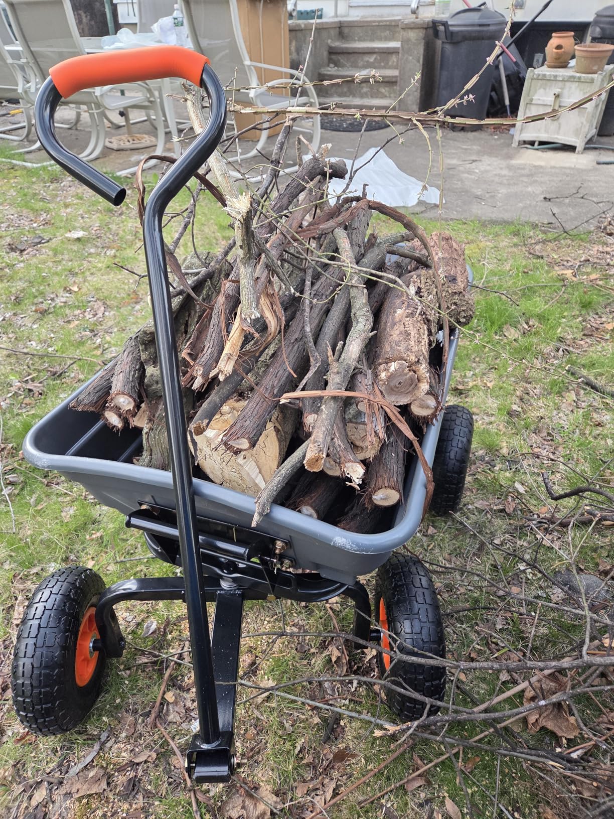 VEVOR 4 Cu.Ft. 600lbs Poly Garden Dump Cart, Heavy Duty 4 Wheel Wheelbarrow Yard Cart Dump Wagon with 10in All Terrain Wheels, Steel Frame and Quick Release System customer photo 1