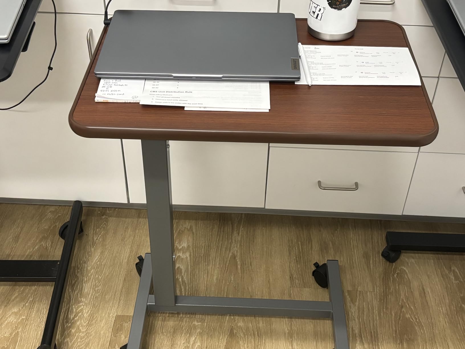 WOTURE Pneumatic Adjustable Overbed Bedside Table with Wheels - Hospital & Home Use, Medical Bed Table, Mobile Standing Desk, Rolling Laptop Cart, Non Tilt Surface (23.6