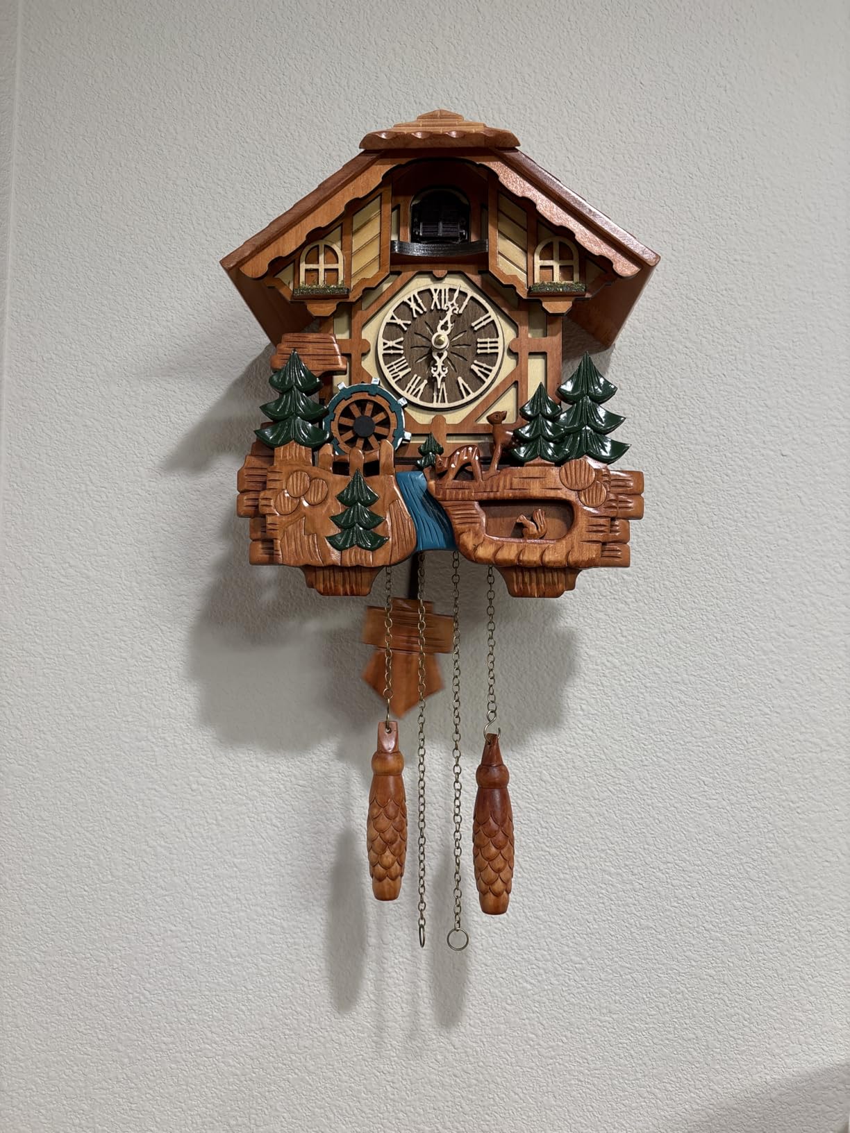Kintrot Cuckoo Clock, Handcrafted Traditional Black Forest Chalet Style Wooden Wall Clock with Singing Bird, Rotating Waterwheel, and 12 Melodies customer photo 1