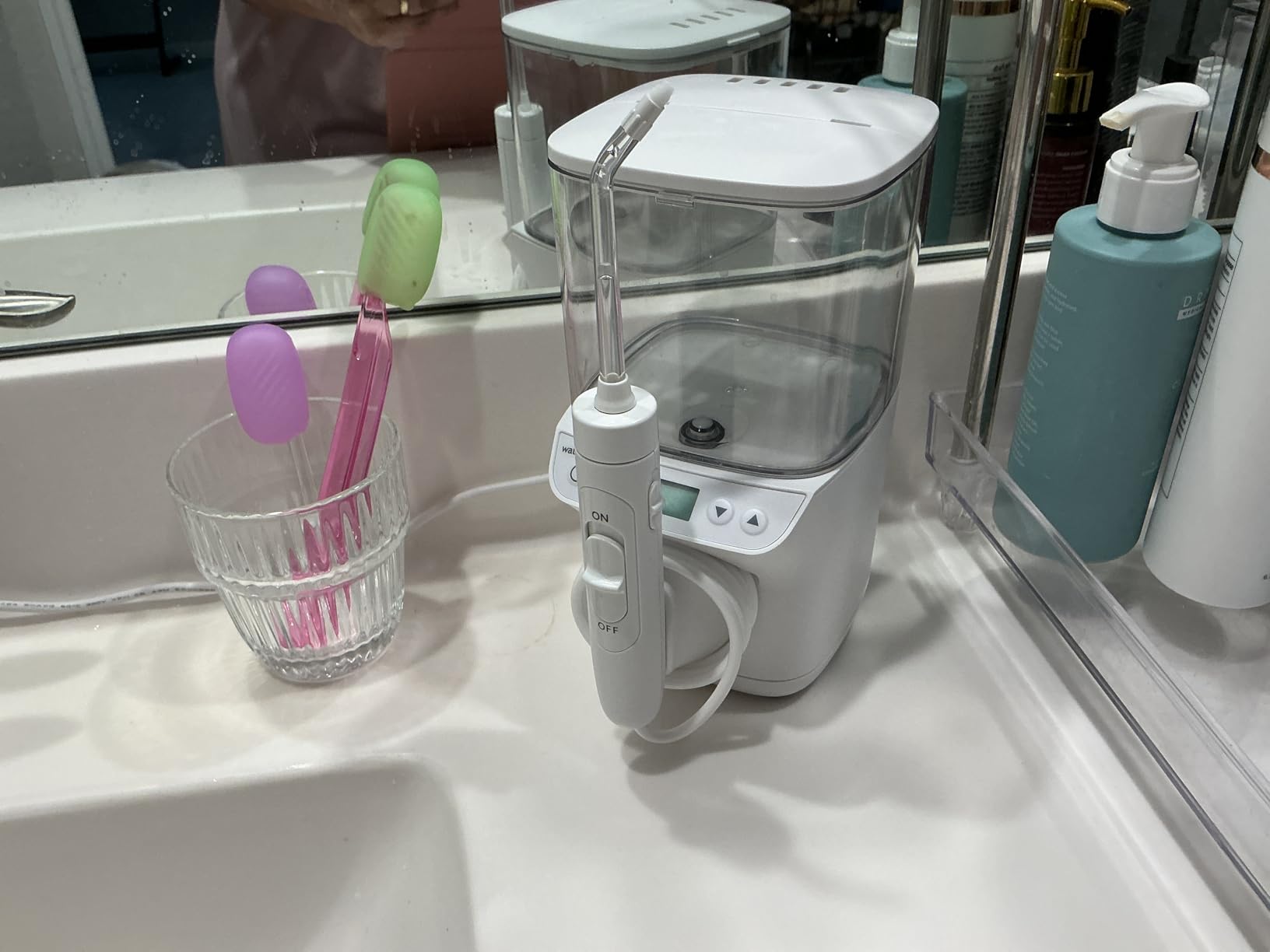 Waterpik Promax Water Flosser with SmartAdvance Mode for Daily Gum Health and Cleaning Teeth, Braces, Implants, ADA Accepted, Small Quiet Design, Electric Flosser with 10 Settings, 5 Tips, WF-23 customer photo 1