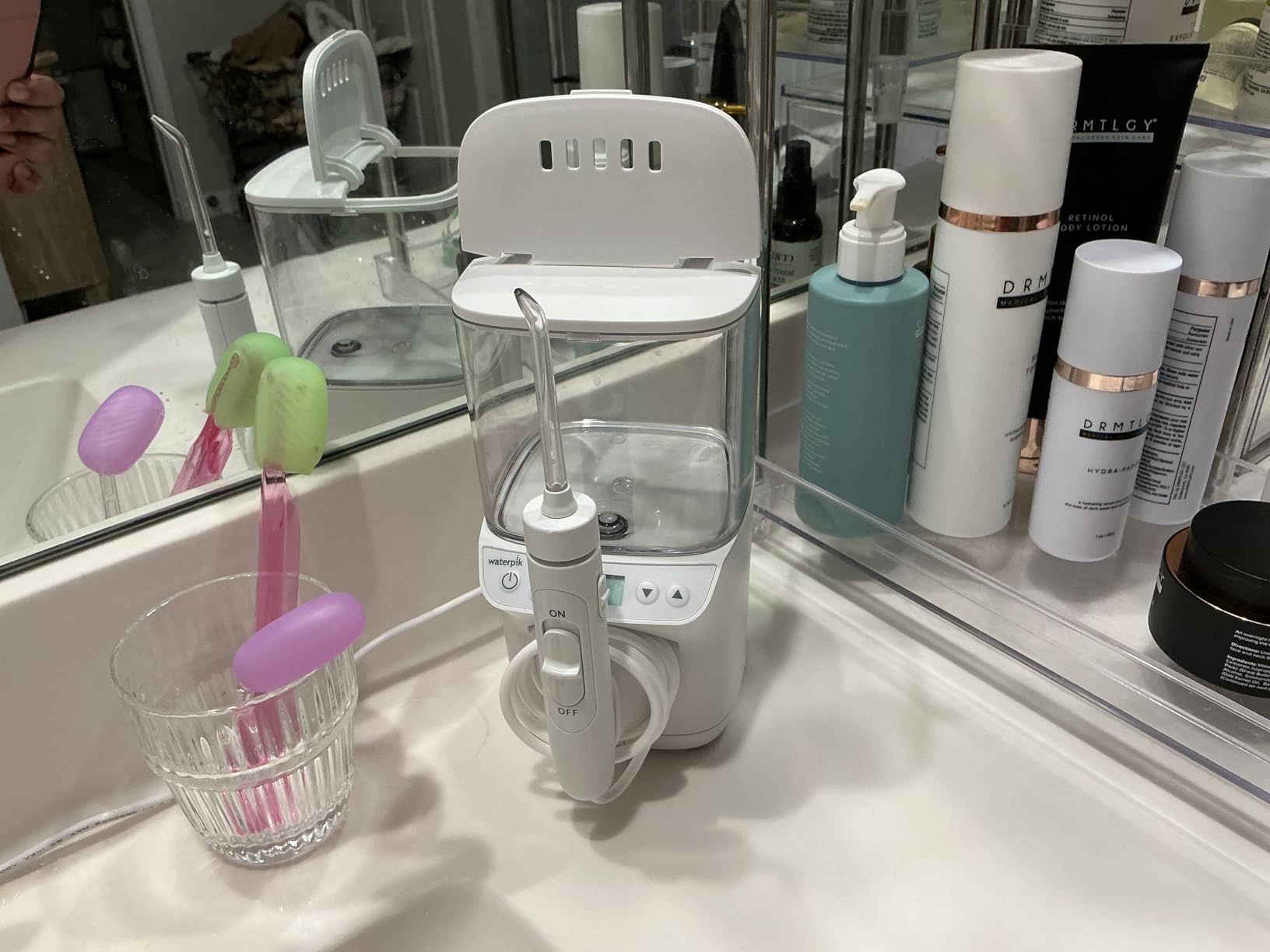 Waterpik Promax Water Flosser with SmartAdvance Mode for Daily Gum Health and Cleaning Teeth, Braces, Implants, ADA Accepted, Small Quiet Design, Electric Flosser with 10 Settings, 5 Tips, WF-23 customer photo 2