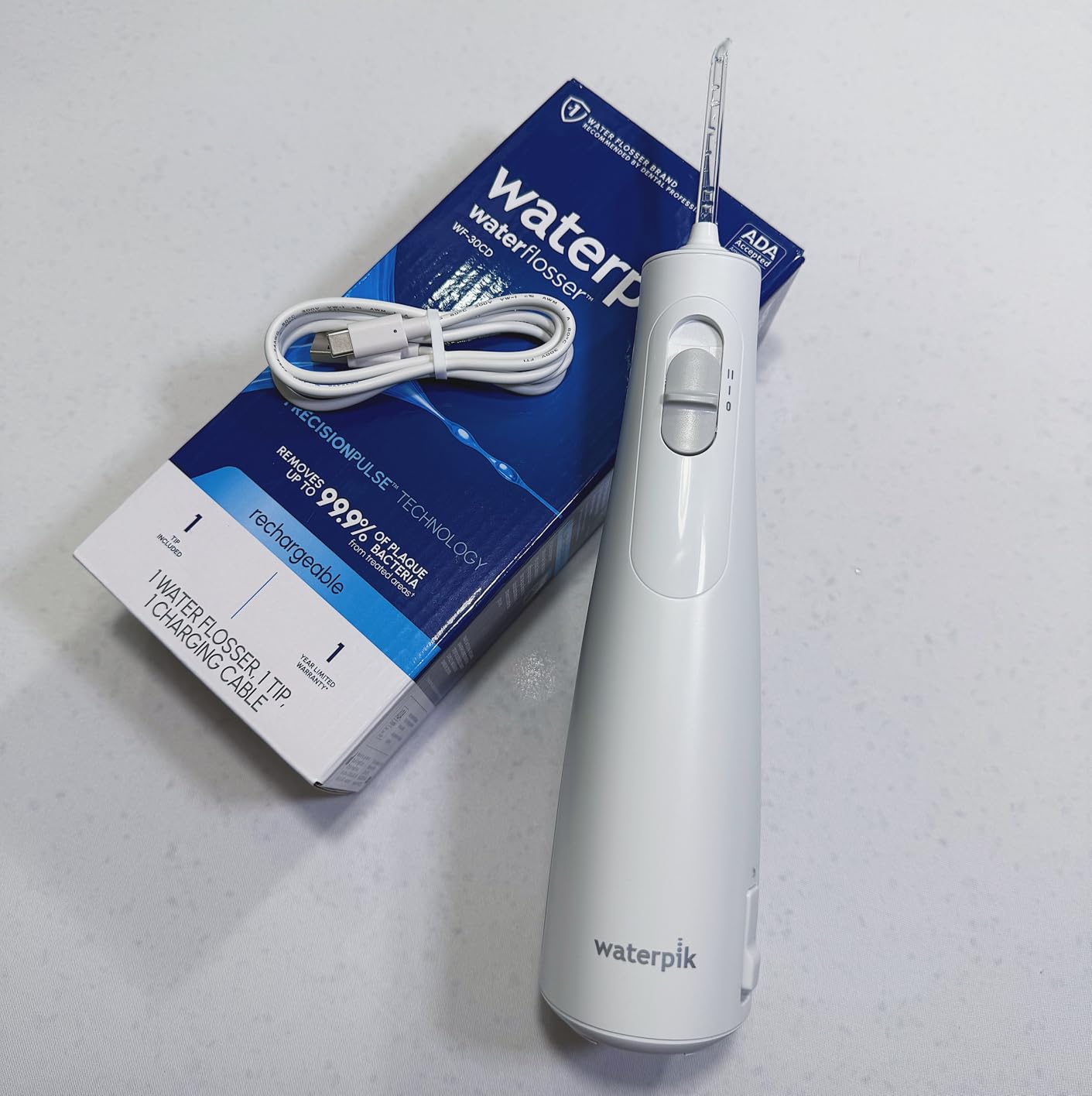 Waterpik Cordless 1100 Rechargeable Portable Water Flosser for Teeth Cleaning and Flossing, Travel, Braces Care, Healthier Gums, Waterproof for Shower, ADA Accepted, WF-30CD Black customer photo 1
