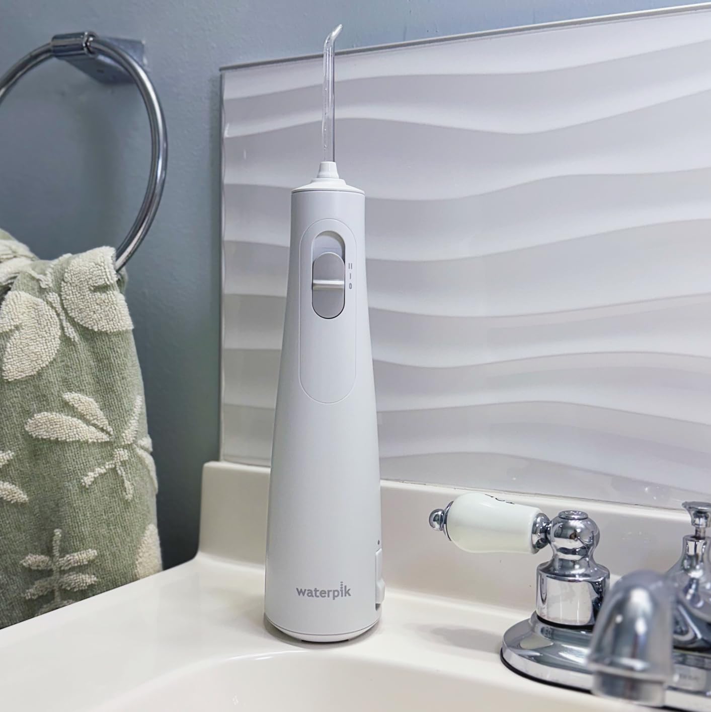 Waterpik Cordless 1100 Rechargeable Portable Water Flosser for Teeth Cleaning and Flossing, Travel, Braces Care, Healthier Gums, Waterproof for Shower, ADA Accepted, WF-30CD Black customer photo 2