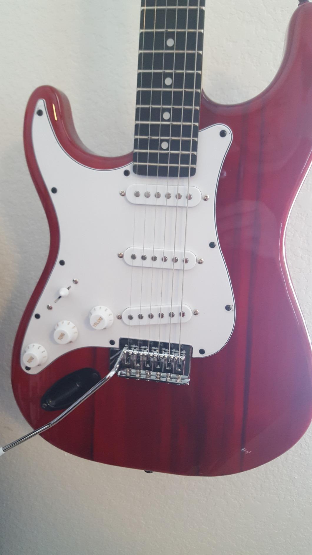 LyxPro Left Hand 39 Inch Electric Guitar and Starter Kit for Lefty Full Size Beginner's Guitar, Amp, Six Strings, Two Picks, Shoulder Strap, Digital Clip On Tuner, Guitar Cable and Soft Case - Red customer photo 2
