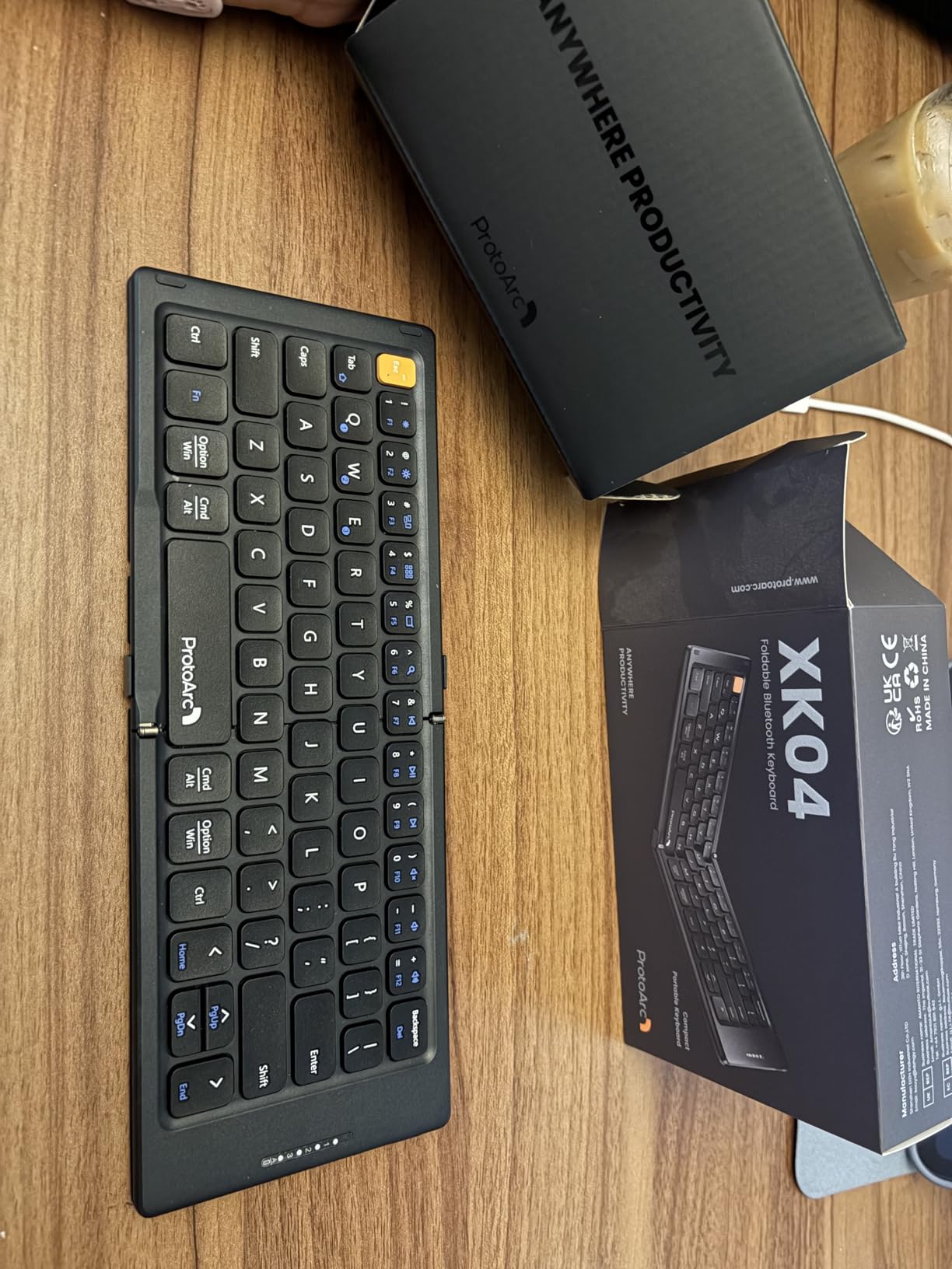 ProtoArc Foldable Compact Keyboard for Phone and Tablet, XK04 Pocket-Sized Travel Bluetooth Keyboard with PU Leather Cover, 3 Device Workflow for On-the-Go Typing - Black customer photo 1